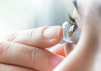 Woman Putting in a Contact lens